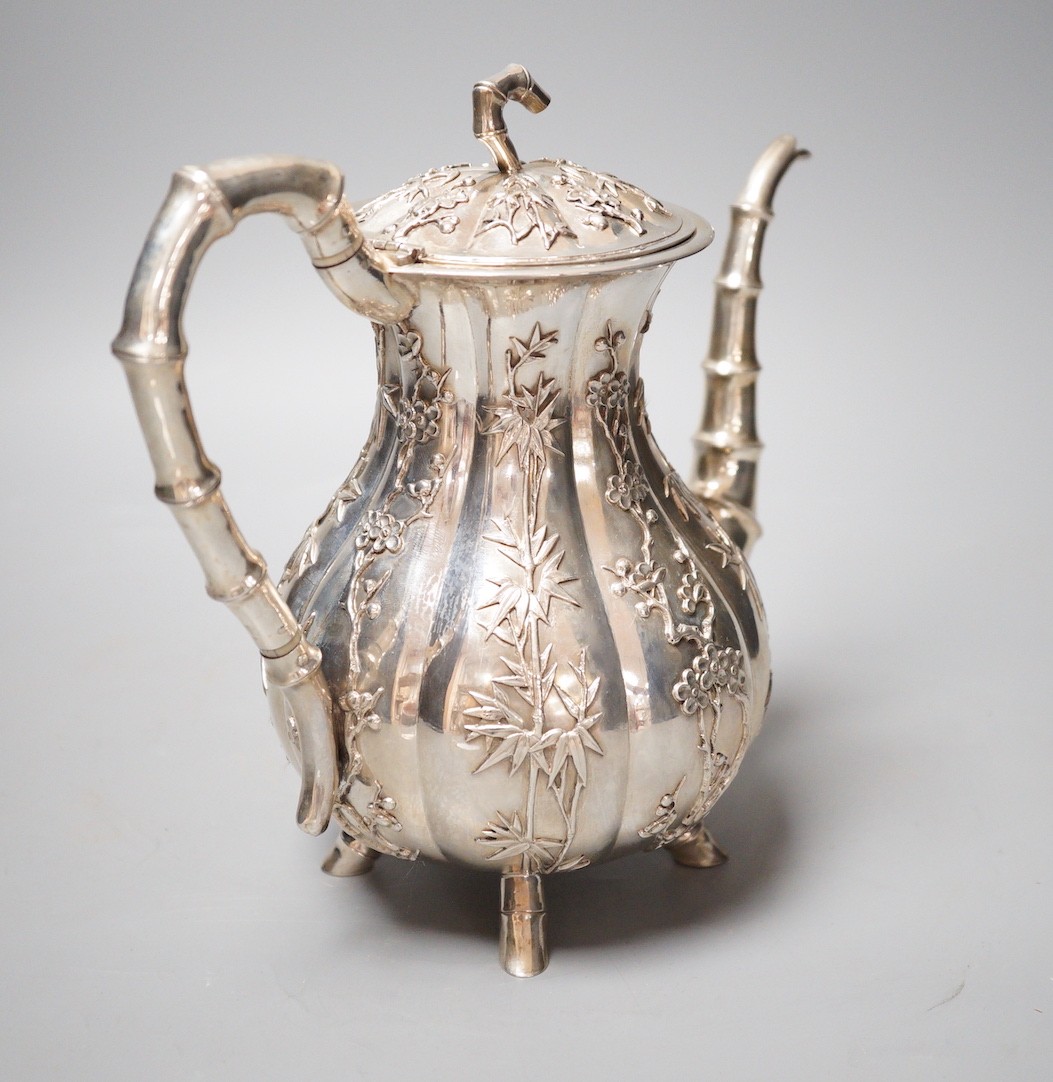 A late 19th/early 20th century Chinese Export white metal coffee pot by Hung Chong, height 20.3cm, gross weight 23.5oz.